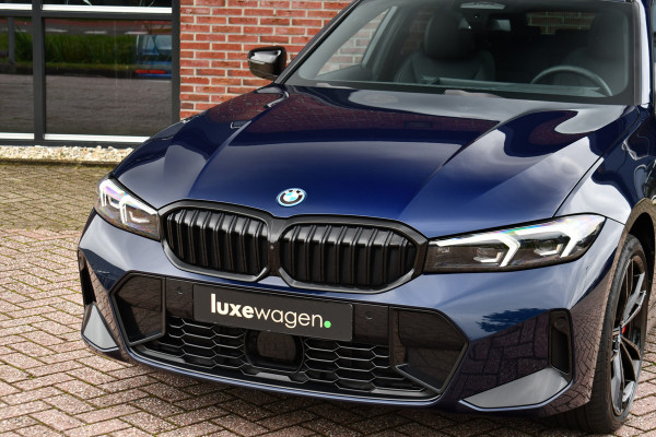 BMW 3 Serie Touring 330e xDrive M-Sport Pro Pano DA-Prof 360 HUD H/K E-zetels 19inch