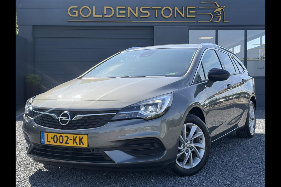 Opel Astra Sports Tourer 1.2 Business Elegance ✓1e Eigenaar✓110pk✓Carplay✓Camera✓Navi✓Clima✓Cruise✓Halfleder✓Comfortstoel✓Pdc V+A✓6 Bak✓Dealer Onderhouden✓Keyless✓Lm velgen✓N.A.P✓Apk tot 06-2027