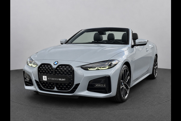 BMW 4 Serie Cabrio 420i M-Sport | Brooklyn Grey | Harman Kardon | 19 inch | Facelift | Widescreen | Stoelverwarming | Carbon