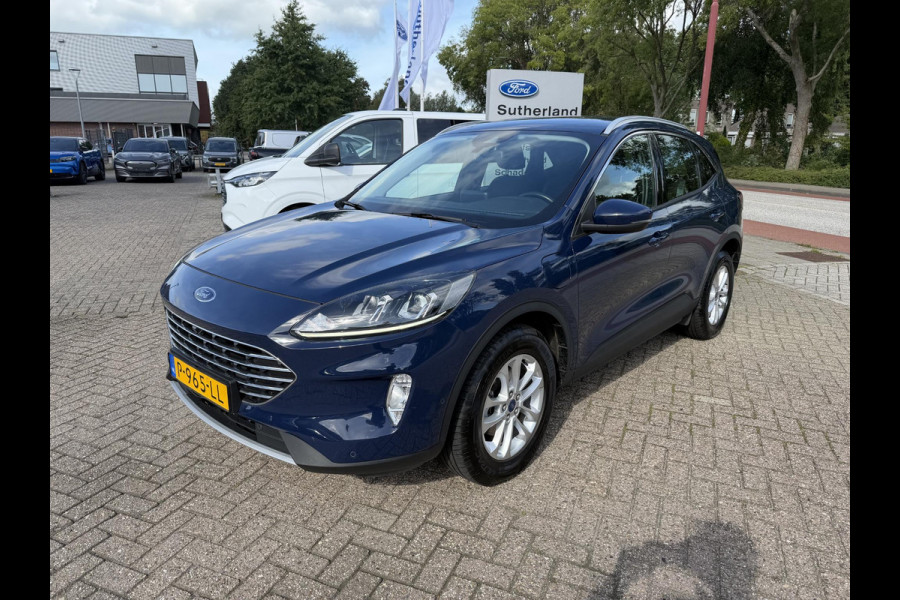 Ford Kuga 2.5 PHEV Titanium | 225pk | Adaptive cruise control | Winter Pack | Dodehoeksensoren | Camera | 1.500kg Trekgewicht