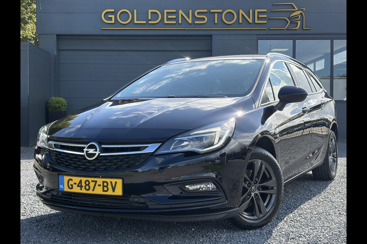 Opel Astra Sports Tourer 1.4 Turbo 120 Jaar Edition ✓150pk✓Carplay✓Navi✓Trekhaak✓Pdc V+A✓Clima✓Cruise✓6 Bak✓Lm velgen✓N.A.P✓Apk tot 02-2028