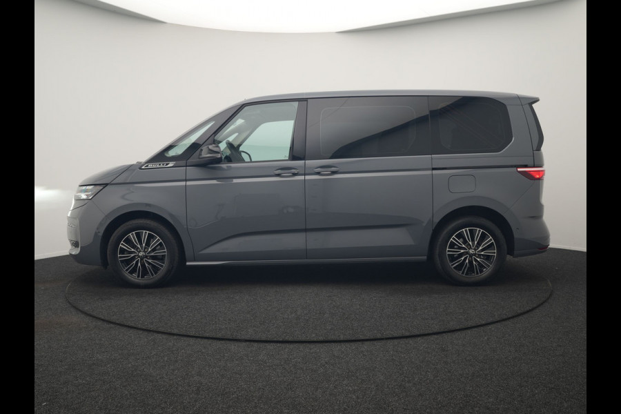 Volkswagen Multivan 1.4 eHybrid Bulli 7 Zits PHEV 218pk Dealer O.H | Trekhaak Af Fabriek | Adaptive Cruise | Camera | Sportstoelen & Stuur Verwarmd | Apple Carplay | BLIS | Navigatie | Virtual | DAB | 17"L.M | Plug In Hybrid |