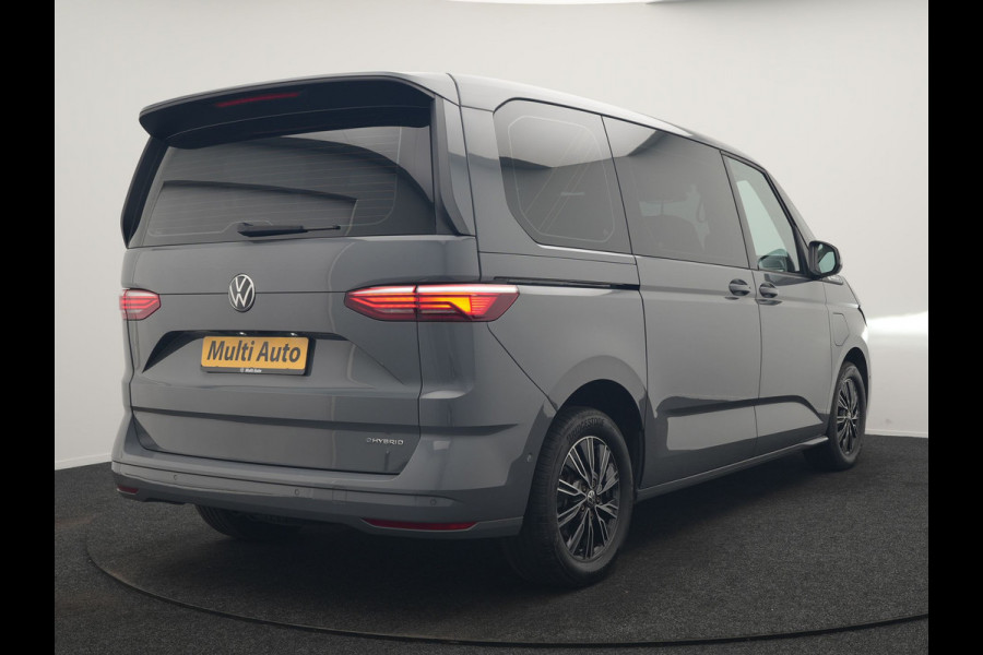 Volkswagen Multivan 1.4 eHybrid Bulli 7 Zits PHEV 218pk Dealer O.H | Trekhaak Af Fabriek | Adaptive Cruise | Camera | Sportstoelen & Stuur Verwarmd | Apple Carplay | BLIS | Navigatie | Virtual | DAB | 17"L.M | Plug In Hybrid |