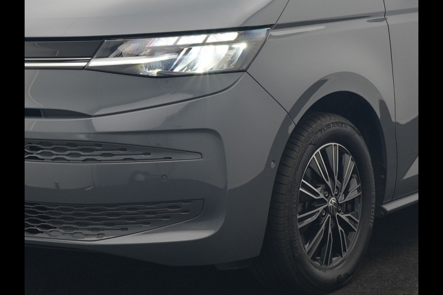 Volkswagen Multivan 1.4 eHybrid Bulli 7 Zits PHEV 218pk Dealer O.H | Trekhaak Af Fabriek | Adaptive Cruise | Camera | Sportstoelen & Stuur Verwarmd | Apple Carplay | BLIS | Navigatie | Virtual | DAB | 17"L.M | Plug In Hybrid |