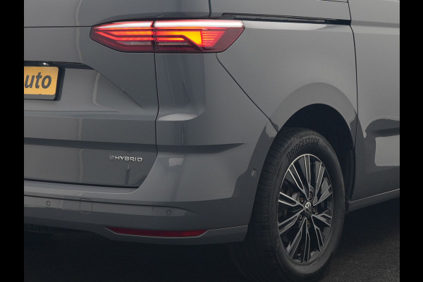 Volkswagen Multivan 1.4 eHybrid Bulli 7 Zits PHEV 218pk Dealer O.H | Trekhaak Af Fabriek | Adaptive Cruise | Camera | Sportstoelen & Stuur Verwarmd | Apple Carplay | BLIS | Navigatie | Virtual | DAB | 17"L.M | Plug In Hybrid |