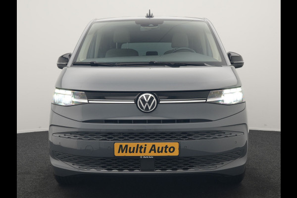 Volkswagen Multivan 1.4 eHybrid Bulli 7 Zits PHEV 218pk Dealer O.H | Trekhaak Af Fabriek | Adaptive Cruise | Camera | Sportstoelen & Stuur Verwarmd | Apple Carplay | BLIS | Navigatie | Virtual | DAB | 17"L.M | Plug In Hybrid |