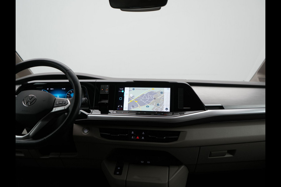 Volkswagen Multivan 1.4 eHybrid Bulli 7 Zits PHEV 218pk Dealer O.H | Trekhaak Af Fabriek | Adaptive Cruise | Camera | Sportstoelen & Stuur Verwarmd | Apple Carplay | BLIS | Navigatie | Virtual | DAB | 17"L.M | Plug In Hybrid |
