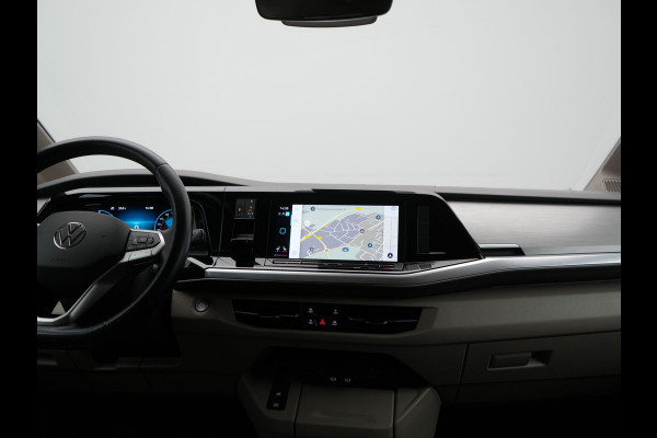 Volkswagen Multivan 1.4 eHybrid Bulli 7 Zits PHEV 218pk Dealer O.H | Trekhaak Af Fabriek | Adaptive Cruise | Camera | Sportstoelen & Stuur Verwarmd | Apple Carplay | BLIS | Navigatie | Virtual | DAB | 17"L.M | Plug In Hybrid |