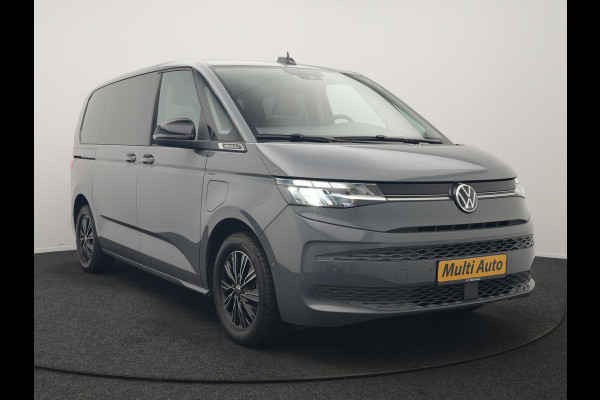 Volkswagen Multivan 1.4 eHybrid Bulli 7 Zits PHEV 218pk Dealer O.H | Trekhaak Af Fabriek | Adaptive Cruise | Camera | Sportstoelen & Stuur Verwarmd | Apple Carplay | BLIS | Navigatie | Virtual | DAB | 17"L.M | Plug In Hybrid |