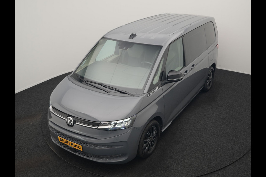 Volkswagen Multivan 1.4 eHybrid Bulli 7 Zits PHEV 218pk Dealer O.H | Trekhaak Af Fabriek | Adaptive Cruise | Camera | Sportstoelen & Stuur Verwarmd | Apple Carplay | BLIS | Navigatie | Virtual | DAB | 17"L.M | Plug In Hybrid |