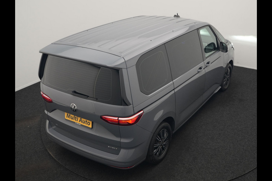 Volkswagen Multivan 1.4 eHybrid Bulli 7 Zits PHEV 218pk Dealer O.H | Trekhaak Af Fabriek | Adaptive Cruise | Camera | Sportstoelen & Stuur Verwarmd | Apple Carplay | BLIS | Navigatie | Virtual | DAB | 17"L.M | Plug In Hybrid |