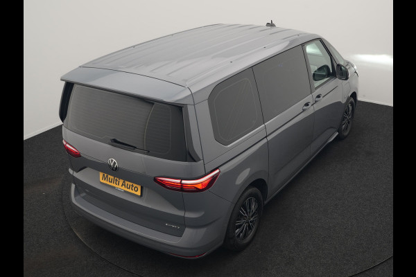 Volkswagen Multivan 1.4 eHybrid Bulli 7 Zits PHEV 218pk Dealer O.H | Trekhaak Af Fabriek | Adaptive Cruise | Camera | Sportstoelen & Stuur Verwarmd | Apple Carplay | BLIS | Navigatie | Virtual | DAB | 17"L.M | Plug In Hybrid |