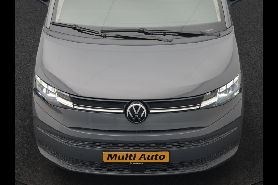 Volkswagen Multivan 1.4 eHybrid Bulli 7 Zits PHEV 218pk Dealer O.H | Trekhaak Af Fabriek | Adaptive Cruise | Camera | Sportstoelen & Stuur Verwarmd | Apple Carplay | BLIS | Navigatie | Virtual | DAB | 17"L.M | Plug In Hybrid |