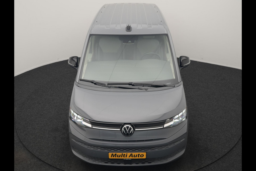 Volkswagen Multivan 1.4 eHybrid Bulli 7 Zits PHEV 218pk Dealer O.H | Trekhaak Af Fabriek | Adaptive Cruise | Camera | Sportstoelen & Stuur Verwarmd | Apple Carplay | BLIS | Navigatie | Virtual | DAB | 17"L.M | Plug In Hybrid |