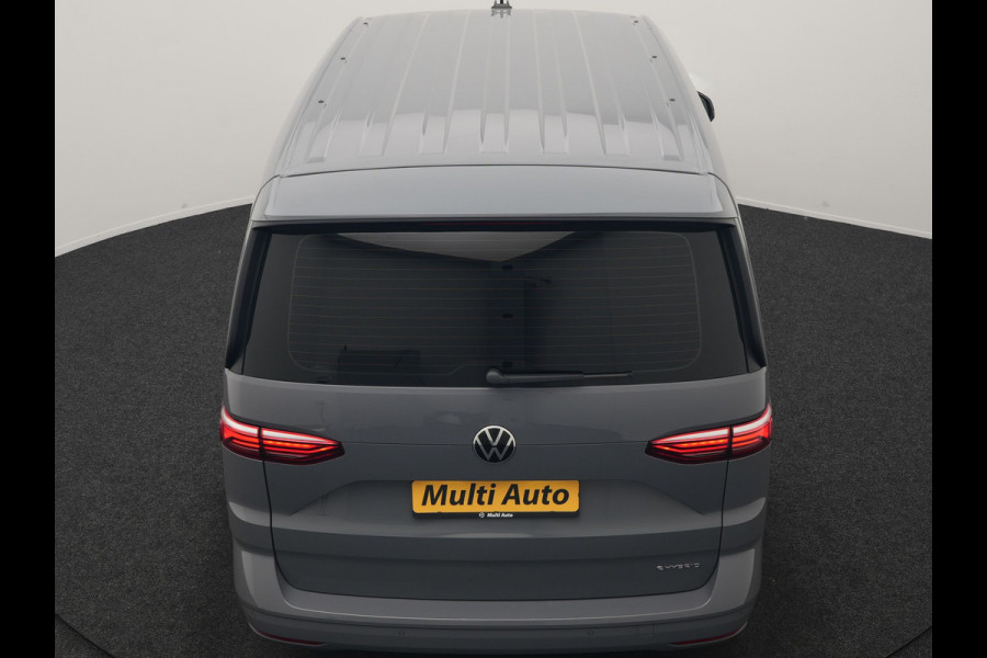 Volkswagen Multivan 1.4 eHybrid Bulli 7 Zits PHEV 218pk Dealer O.H | Trekhaak Af Fabriek | Adaptive Cruise | Camera | Sportstoelen & Stuur Verwarmd | Apple Carplay | BLIS | Navigatie | Virtual | DAB | 17"L.M | Plug In Hybrid |