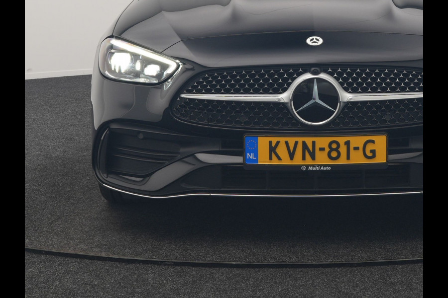 Mercedes-Benz C-Klasse Estate 300 e AMG Line PHEV 313pk Dealer O.H | Trekhaak Af Fabriek | Adaptive Cruise | Camera | Digital Light | Alcantara Sportstoelen Memory & Verwarmd | Keyless | Sfeerverlichting | Apple Carplay | Blis | DAB | 18"L.M | Plug In Hybrid