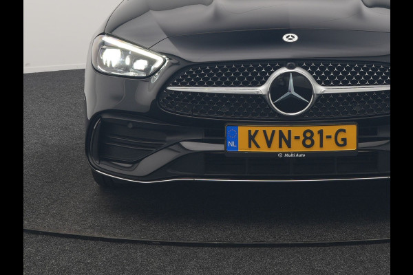Mercedes-Benz C-Klasse Estate 300 e AMG Line PHEV 313pk Dealer O.H | Trekhaak Af Fabriek | Adaptive Cruise | Camera | Digital Light | Alcantara Sportstoelen Memory & Verwarmd | Keyless | Sfeerverlichting | Apple Carplay | Blis | DAB | 18"L.M | Plug In Hybrid