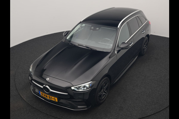 Mercedes-Benz C-Klasse Estate 300 e AMG Line PHEV 313pk Dealer O.H | Trekhaak Af Fabriek | Adaptive Cruise | Camera | Digital Light | Alcantara Sportstoelen Memory & Verwarmd | Keyless | Sfeerverlichting | Apple Carplay | Blis | DAB | 18"L.M | Plug In Hybrid