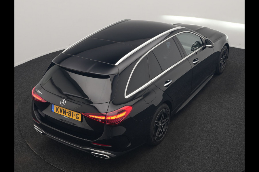 Mercedes-Benz C-Klasse Estate 300 e AMG Line PHEV 313pk Dealer O.H | Trekhaak Af Fabriek | Adaptive Cruise | Camera | Digital Light | Alcantara Sportstoelen Memory & Verwarmd | Keyless | Sfeerverlichting | Apple Carplay | Blis | DAB | 18"L.M | Plug In Hybrid