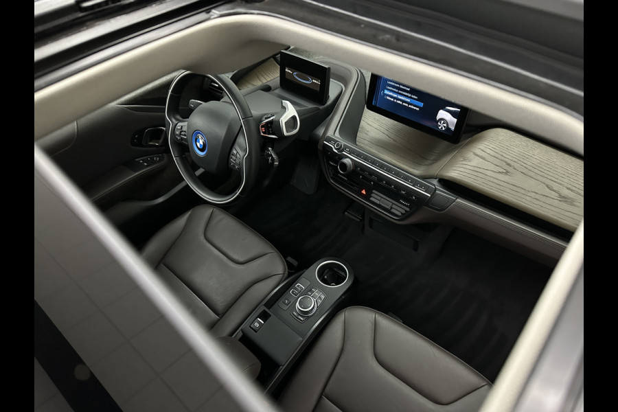 BMW i3 Unique Forever Edition 120Ah Sport-Pakket | Navi-Prof | Warmtepomp | 94% SOH | Snel Laden | Panorama | Camera | LED | Leder | 20'' | Stoelverwarming |