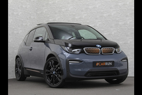 BMW i3 Unique Forever Edition 120Ah Sport-Pakket | Navi-Prof | Warmtepomp | 94% SOH | Snel Laden | Panorama | Camera | LED | Leder | 20'' | Stoelverwarming |
