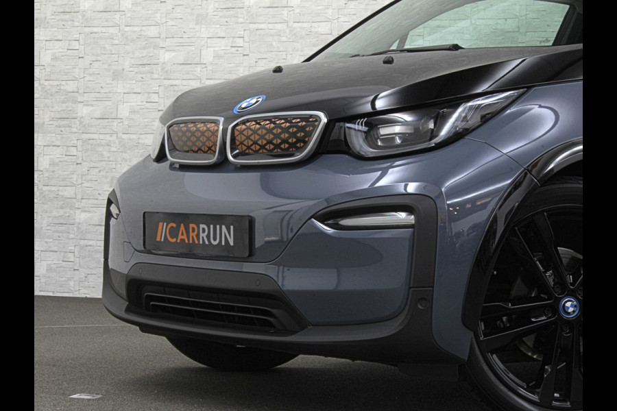 BMW i3 Unique Forever Edition 120Ah Sport-Pakket | Navi-Prof | Warmtepomp | 94% SOH | Snel Laden | Panorama | Camera | LED | Leder | 20'' | Stoelverwarming |