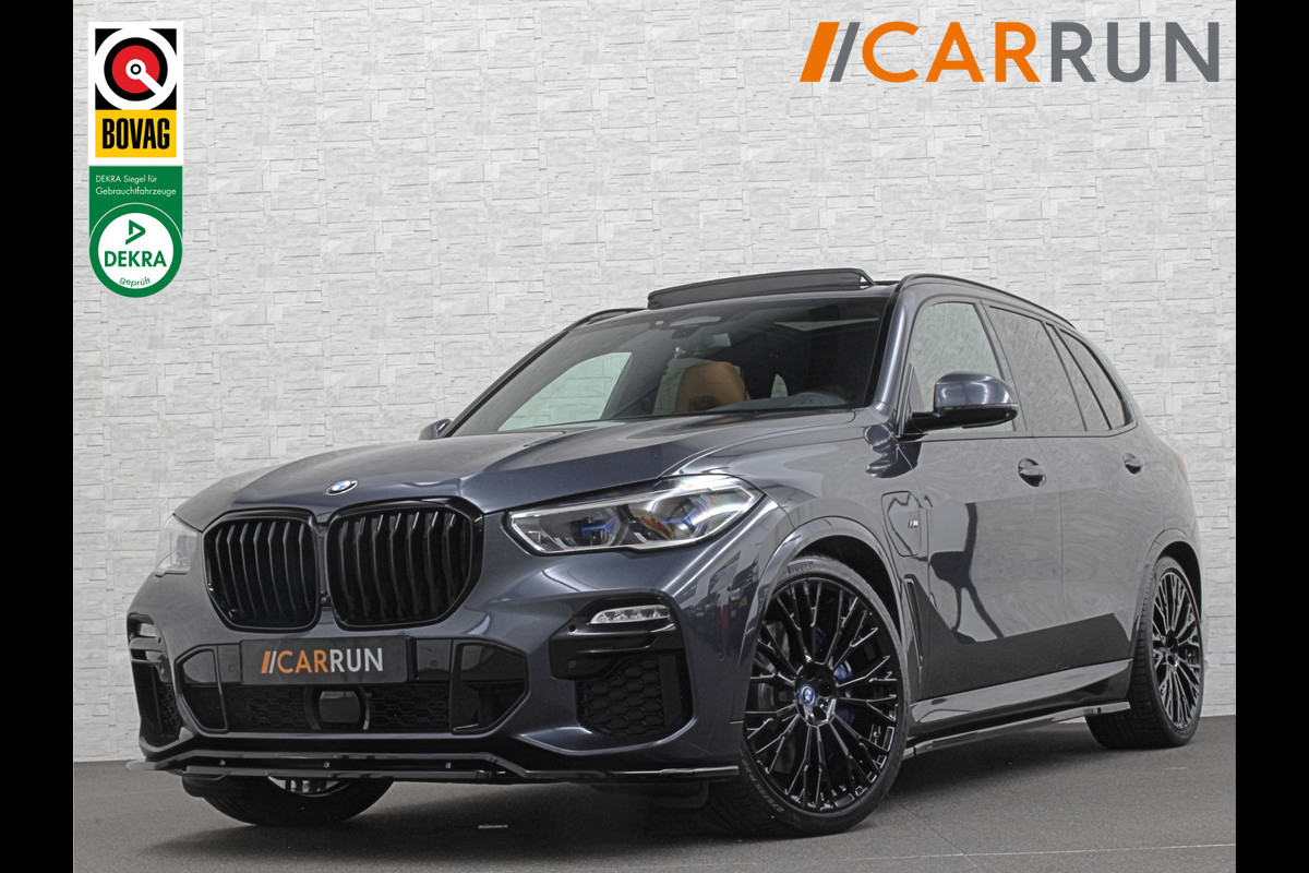 BMW X5 45e M-Performance Seats | 360 View | Panorama | ACC | Kristal pook | Head-Up | Laser-LED | Memory | Harman-Kardon | Keyless-Go | Trekhaak | Drive Assist Pro. | Leder | 4-Zone Clima | Standkachel | Rijklaarprijs & Bovag garantie | Carplay | Draadloos Laden | DAB | Sfeerverlichting |