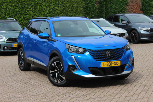 Peugeot e-2008 EV Allure Pack 50 kWh / SoH 91 % / Camera / Keyless / CarPlay / Half Leder / 17'' / Stoelverwarming / DAB / Cruise Control