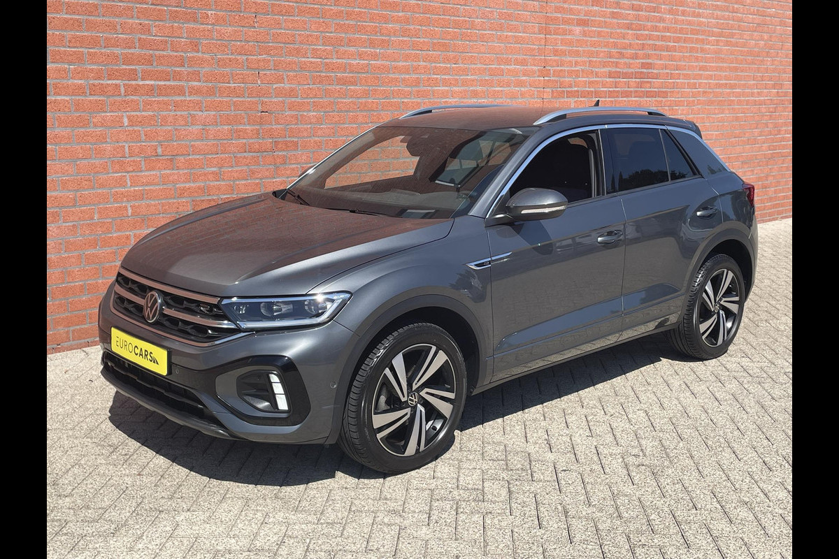 Volkswagen T-Roc 1.5 TSI 150pk DSG R-Line Navigatie Apple Carplay / Android Auto Parkeersensoren Afneembare trekhaak Park Assist Adaptive Cruise Control Elektrische achterklep Stoel- en stuurverwarming Climate Control Ledverlichting Virtual Cockpit