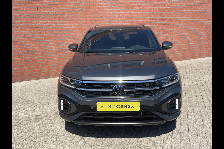 Volkswagen T-Roc 1.5 TSI 150pk DSG R-Line Navigatie Apple Carplay / Android Auto Parkeersensoren Afneembare trekhaak Park Assist Adaptive Cruise Control Elektrische achterklep Stoel- en stuurverwarming Climate Control Ledverlichting Virtual Cockpit