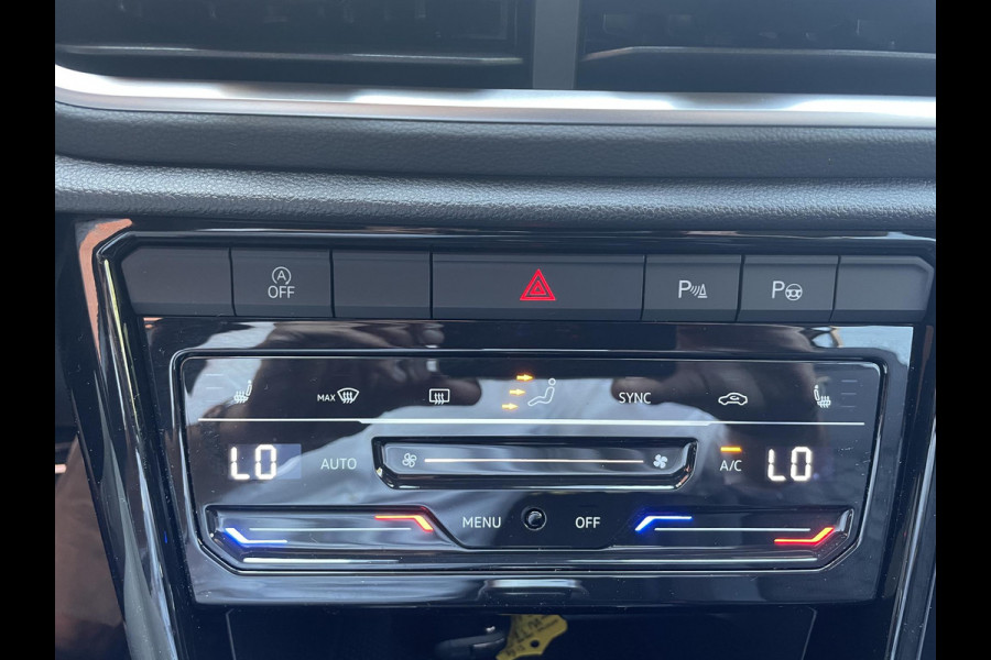Volkswagen T-Roc 1.5 TSI 150pk DSG R-Line Navigatie Apple Carplay / Android Auto Parkeersensoren Afneembare trekhaak Park Assist Adaptive Cruise Control Elektrische achterklep Stoel- en stuurverwarming Climate Control Ledverlichting Virtual Cockpit