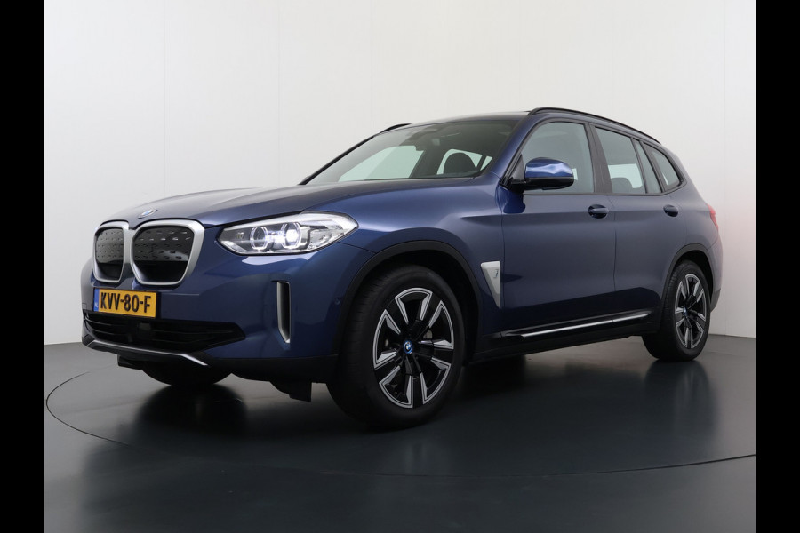 BMW iX3 Panoramadak SOH 99% Leder Adap.Cruise Camera Apple Carplay Android Auto 3-Zone Ecc Executive 80kWh Elek.Achterklep Adaptief onderstel Stoelverwarming Pdc Lmv Led Elek.Stoelen Isofix Bluetooth