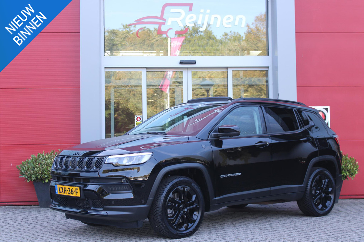 Jeep Compass 4xe 240PK Plug-in Hybrid Electric NORTH STAR | PANORAMA SCHUIF/KANTEL DAK | WINTERPACK: STOEL/STUUR/PARKEERNSENSOREN/RUITENSPROEIER VERWARMBAAR | SAFETY PACK: 360° CAMERA/DODEHOEK BEWAKING/BUITENSPIEGELS MET INSTAPVERLICHTING | 10,1" TOUCHSCREEN MET NAVIGATIE/ADAPTIVE CRUISE CONTROL INCL LANE CENTERING ASSIST/VERKEERSBORDEN INFORMATIE/DRAADLOZE TELEFOONLADER/HANDSFREE ELEKTRISCH BEDIENBARE ACHTERKLEP | PREMIUM AUDIO SYSTEEM MET 9 SPEAKERS & SUBWOOVER "ALPINE" | KEYLESS ENTRY | DRAADLOZE APPLE CARPLAY/ANDROID AUTO | 18" LICHTMETALEN VELGEN | ALL SEASON BANDEN |