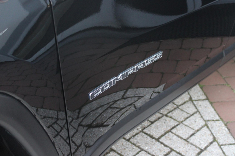 Jeep Compass 4xe 240PK Plug-in Hybrid Electric NORTH STAR | PANORAMA SCHUIF/KANTEL DAK | WINTERPACK: STOEL/STUUR/PARKEERNSENSOREN/RUITENSPROEIER VERWARMBAAR | SAFETY PACK: 360° CAMERA/DODEHOEK BEWAKING/BUITENSPIEGELS MET INSTAPVERLICHTING | 10,1" TOUCHSCREEN MET NAVIGATIE/ADAPTIVE CRUISE CONTROL INCL LANE CENTERING ASSIST/VERKEERSBORDEN INFORMATIE/DRAADLOZE TELEFOONLADER/HANDSFREE ELEKTRISCH BEDIENBARE ACHTERKLEP | PREMIUM AUDIO SYSTEEM MET 9 SPEAKERS & SUBWOOVER "ALPINE" | KEYLESS ENTRY | DRAADLOZE APPLE CARPLAY/ANDROID AUTO | 18" LICHTMETALEN VELGEN | ALL SEASON BANDEN |