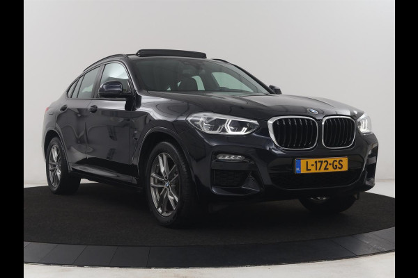 BMW X4 xDrive20i Business Edition | M-sport | Panoramadak | Leder | Memory | Stuur/stoel verwarming | Cruise control | Camera | Park assist | Carplay | Sfeerverlichting | Climate control