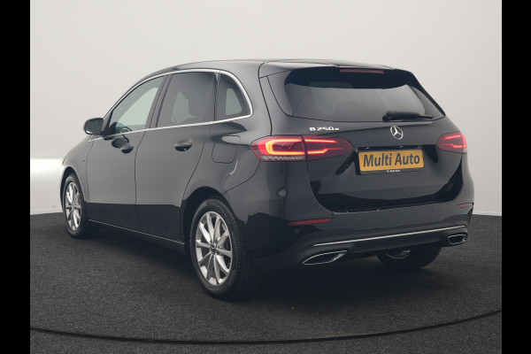 Mercedes-Benz B-Klasse 250 e Premium PHEV 218pk Dealer O.H. | Trekhaak Af Fabriek | Adaptive Cruise | Head Up | Burmester Audio | Camera | Lederen Sportstoelen Memory & Verwarmd | BLIS | Apple Carplay | Widescreen Navi | DAB | Plug In Hybrid |