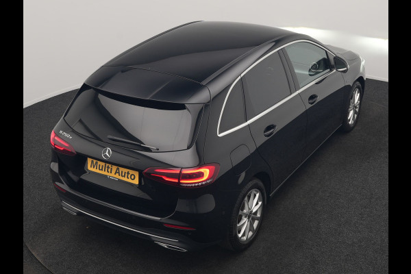 Mercedes-Benz B-Klasse 250 e Premium PHEV 218pk Dealer O.H. | Trekhaak Af Fabriek | Adaptive Cruise | Head Up | Burmester Audio | Camera | Lederen Sportstoelen Memory & Verwarmd | BLIS | Apple Carplay | Widescreen Navi | DAB | Plug In Hybrid |