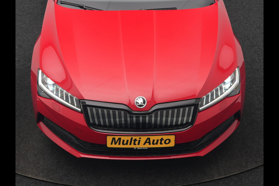 Škoda Superb Combi 1.4 TSI iV Sportline Business PHEV 218pk Dealer O.H. | Trekhaak Af Fabriek | Panodak | Adaptive Cruise | SOH 89,8% | Camera | Canton Audio | Alcantara Sportstoelen Memory & Verwarmd | Stuur Verwarmd | Sfeerverlichting | Keyless | BLIS | Crystal Plug In Hybrid |