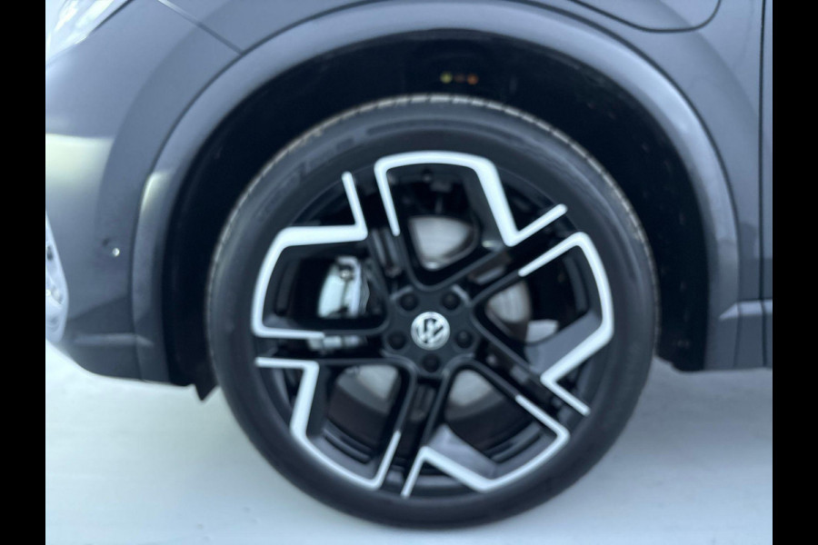 Volkswagen Tiguan 1.5 eHybrid R-Line Edition 272 pk Automaat (DSG) | Verlengde garantie | Navigatie | Panorama dak | Trekhaak (wegklapbaar) | Achteruitrijcamera (park assist) | Rondomzicht camera | Black-Style pakket | R-Line |