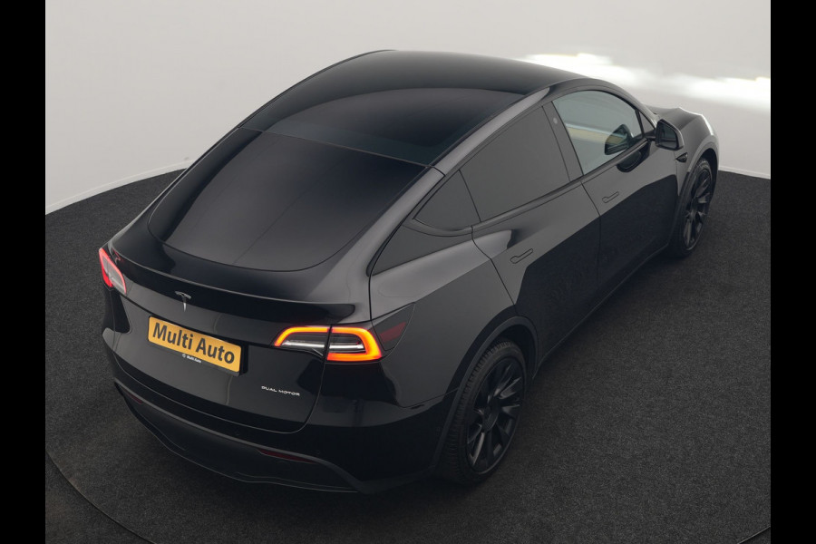 Tesla Model Y Dual Motor Long Range AWD 441 pk | Trekhaak Afn. | Full Self-Driving Capability | Panodak | Adaptive Cruise | 360 Camera | Lederen Sportstoelen Memory & Verwarmd | Navigatie |