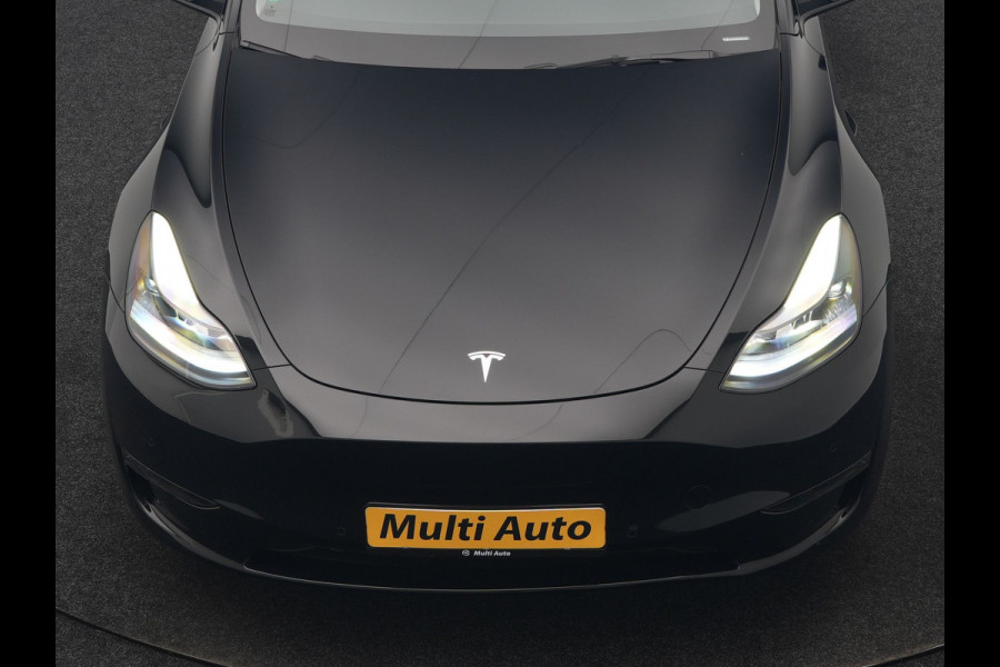 Tesla Model Y Dual Motor Long Range AWD 441 pk | Trekhaak Afn. | Full Self-Driving Capability | Panodak | Adaptive Cruise | 360 Camera | Lederen Sportstoelen Memory & Verwarmd | Navigatie |