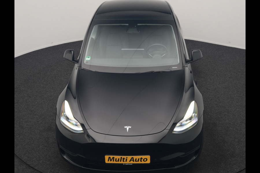 Tesla Model Y Dual Motor Long Range AWD 441 pk | Trekhaak Afn. | Full Self-Driving Capability | Panodak | Adaptive Cruise | 360 Camera | Lederen Sportstoelen Memory & Verwarmd | Navigatie |