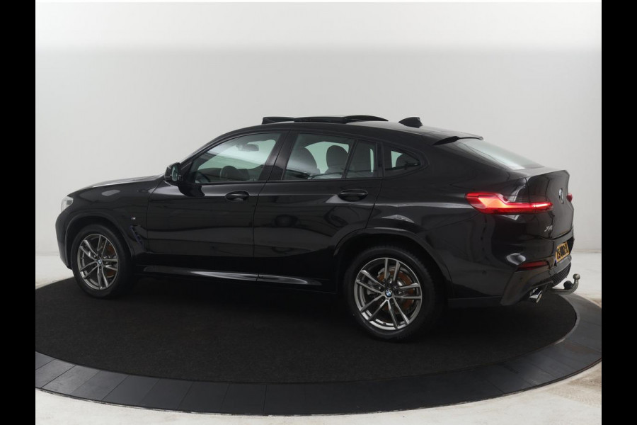 BMW X4 xDrive20i High Executive Edition M-sport | Panoramadak | Leder | Trekhaak | Camera | Sfeerverlichting | Stoelverwarming | Full LED | Climate control | Park assist | Cruise control |