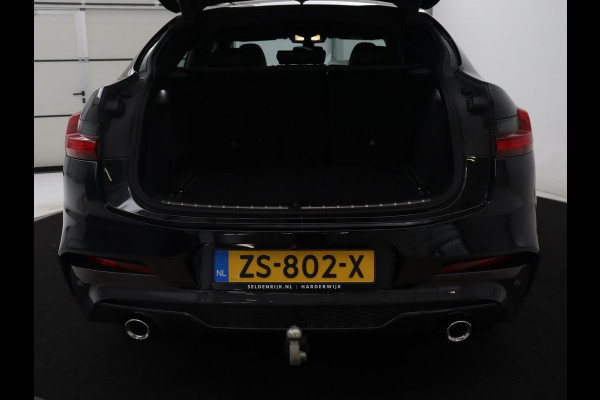 BMW X4 xDrive20i High Executive Edition M-sport | Panoramadak | Leder | Trekhaak | Camera | Sfeerverlichting | Stoelverwarming | Full LED | Climate control | Park assist | Cruise control |
