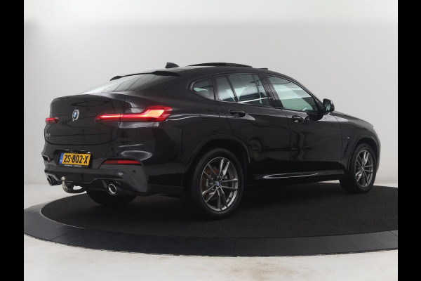 BMW X4 xDrive20i High Executive Edition M-sport | Panoramadak | Leder | Trekhaak | Camera | Sfeerverlichting | Stoelverwarming | Full LED | Climate control | Park assist | Cruise control |