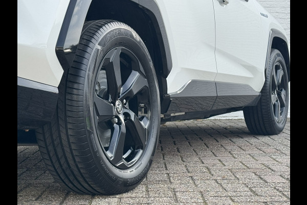 Toyota RAV4 2.5 Hybrid AWD Bi-Tone Trekhaak Leder Panorama JBL Verwarmde voorruit en stuur