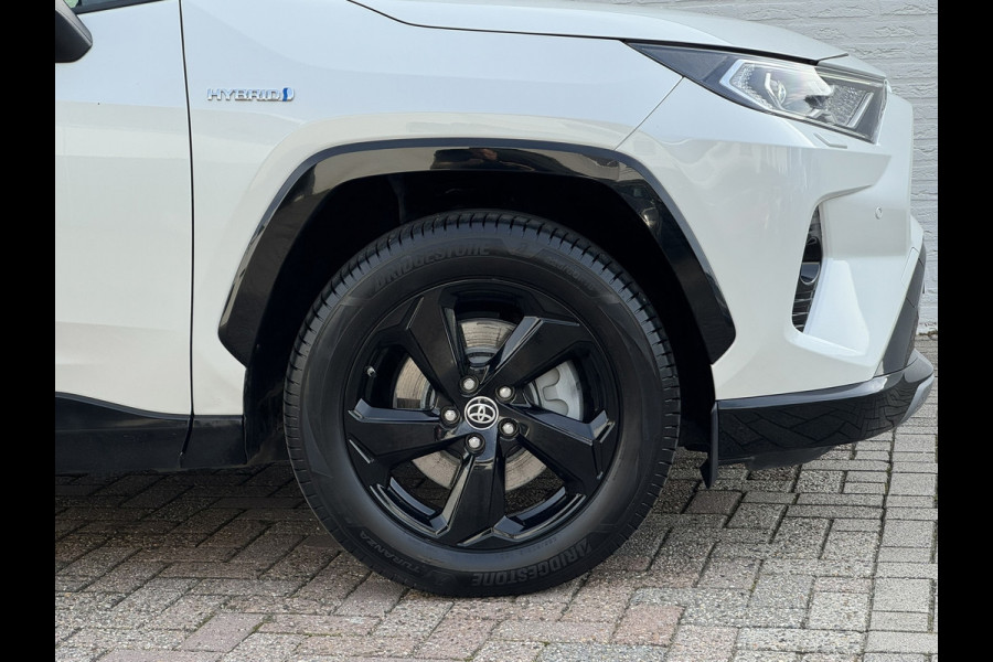 Toyota RAV4 2.5 Hybrid AWD Bi-Tone Trekhaak Leder Panorama JBL Verwarmde voorruit en stuur