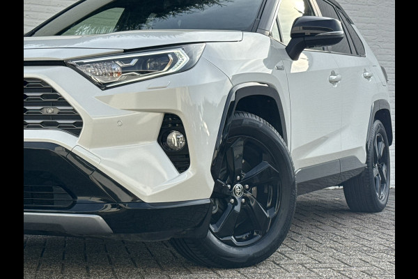 Toyota RAV4 2.5 Hybrid AWD Bi-Tone Trekhaak Leder Panorama JBL Verwarmde voorruit en stuur