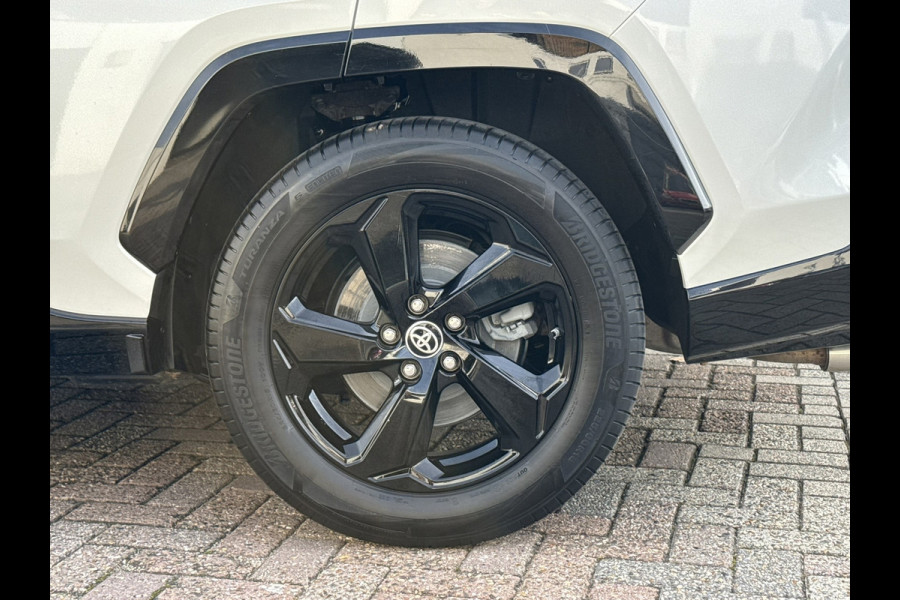 Toyota RAV4 2.5 Hybrid AWD Bi-Tone Trekhaak Leder Panorama JBL Verwarmde voorruit en stuur