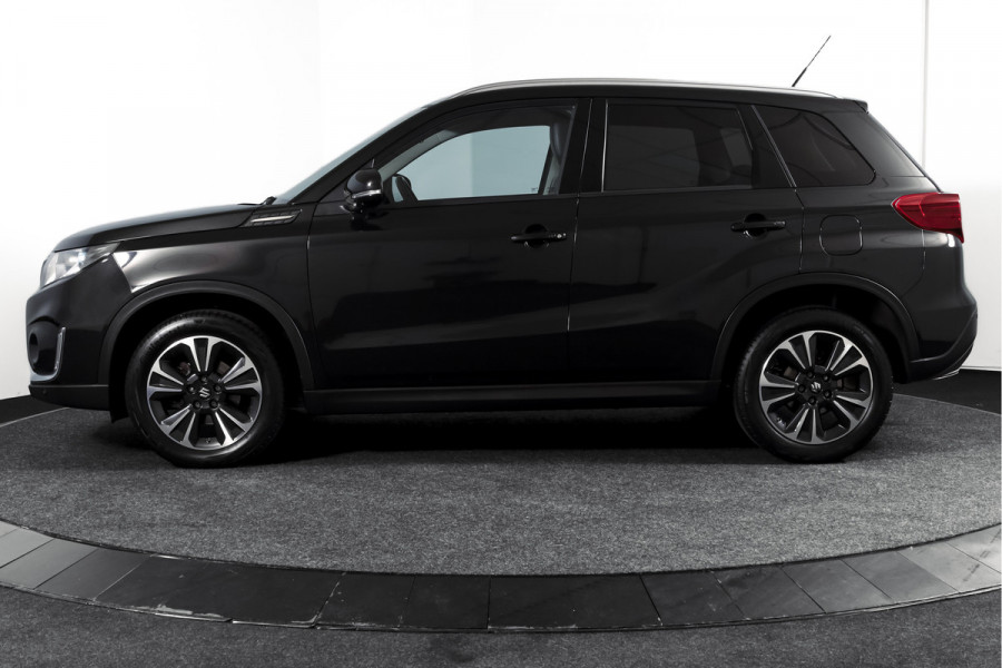 Suzuki Vitara 1.4 Boosterjet 140 PK Stijl Org. NL. | Afn. Trekhaak | Adapt. Cruise | Stoelverw. | PDC | Camera | NAV + App. Connect  | ECC | LM 17" |
